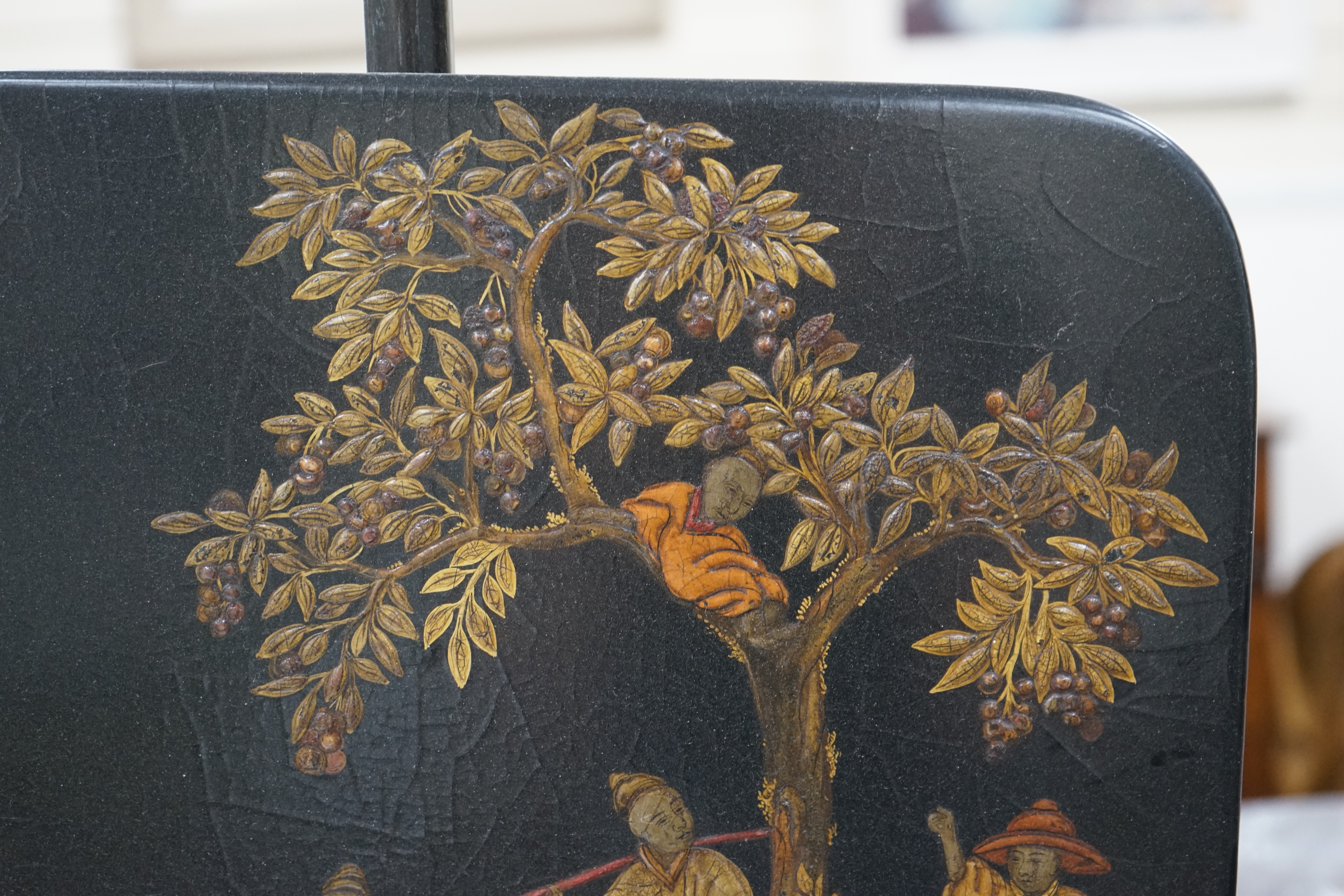 A pair of 19th century chinoiserie lacquer pole screens, height 152cm